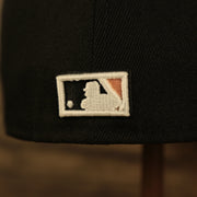 Close up of the MLB Batterman logo on the Atlanta Braves Glow In The Dark 1995 World Series Peach Bottom 59Fifty Side Patch Fitted Cap
