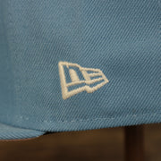 Close up of the New Era logo of the New York Yankees Glow In The Dark 27x World Series Champs Patch Pink Bottom Side Patch 59Fifty Fitted Cap