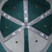 new era 39thirty taping on the Philadelphia Eagles Onfield NFL Sideline Side Patch 39Thirty Flexfit Cap | Midnight Green 39Thirty Cap