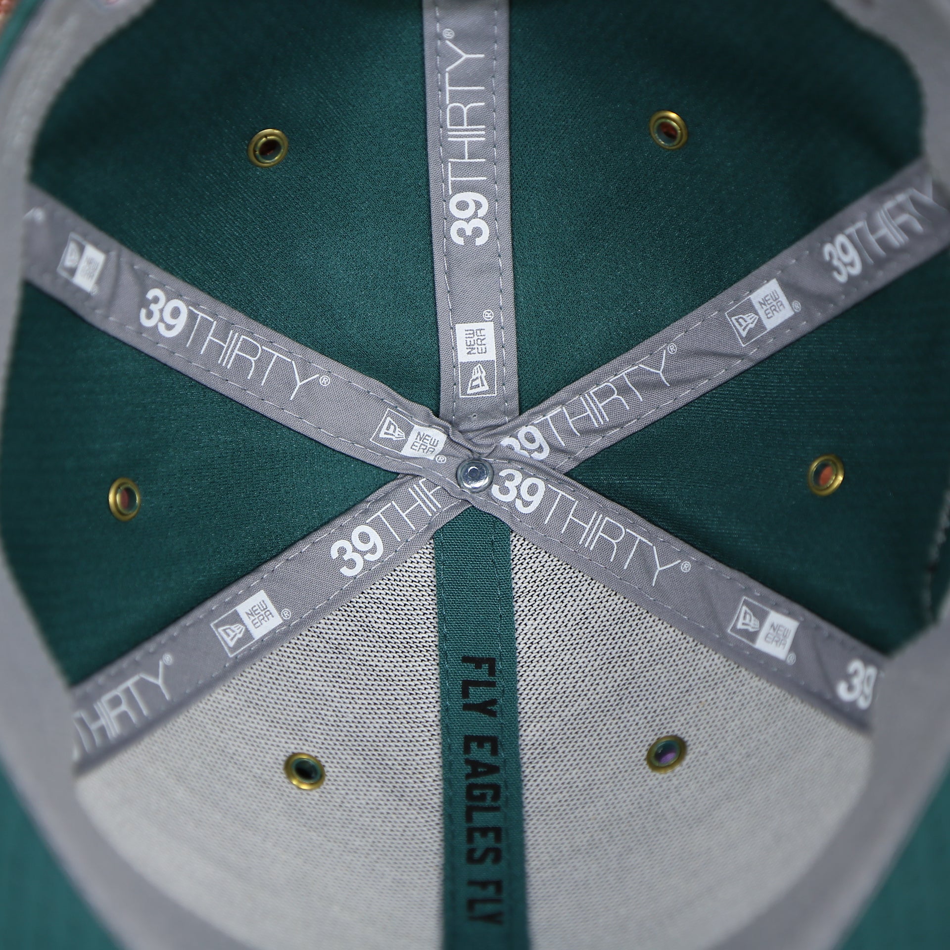 new era 39thirty taping on the Philadelphia Eagles Onfield NFL Sideline Side Patch 39Thirty Flexfit Cap | Midnight Green 39Thirty Cap