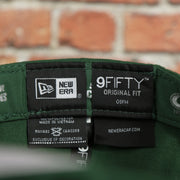 new era label on the Green Bay Packers Four Time Super Bowl Champions Side Patch 59Fifty Fitted Cap | Green Fitted Cap