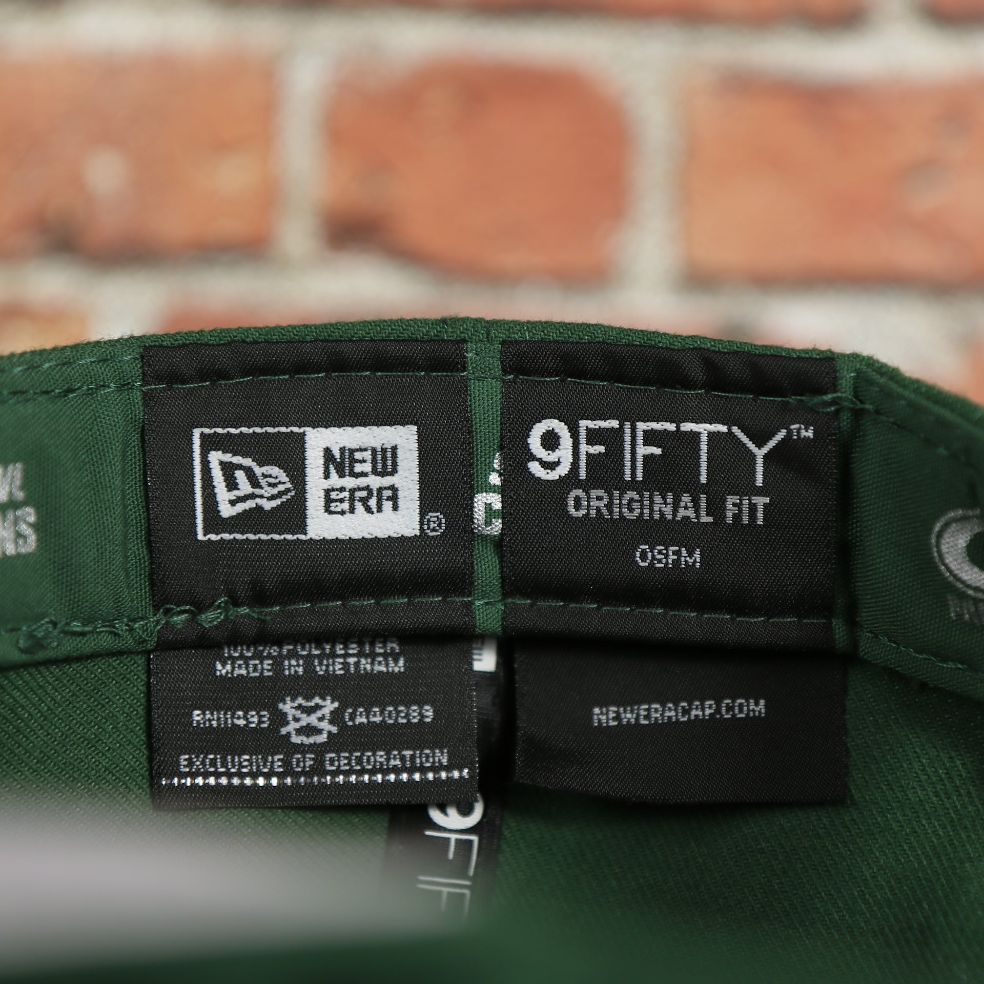 new era label on the Green Bay Packers Four Time Super Bowl Champions Side Patch 59Fifty Fitted Cap | Green Fitted Cap