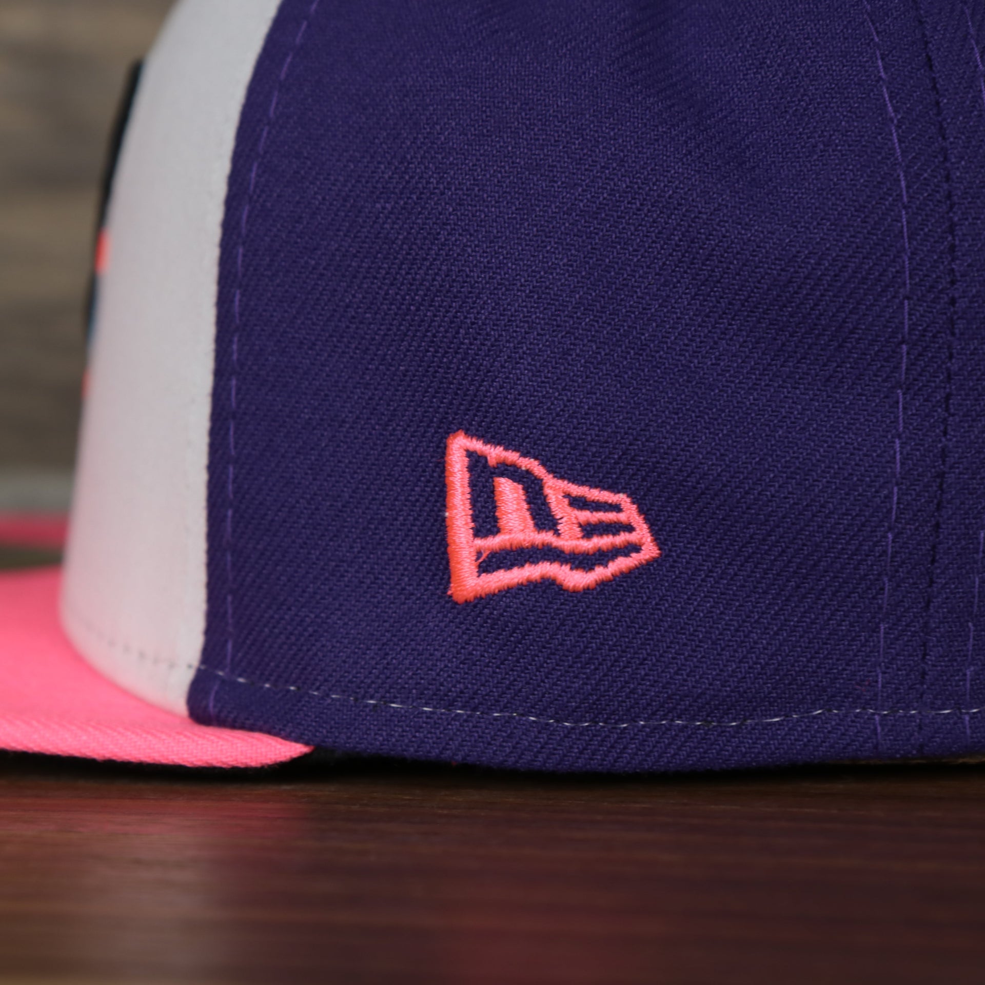 new era logo on the Jersey Shore Blue Claws 2022 Medusas de Jersey Shore Copa de la Diversion On-Field Black Bottom 5950 Fitted Cap | Purple/White