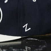 zephyr logo on the BYU Cougars Green Bottom Arched Wordmark Snapback Cap | Navy Blue Snap Cap