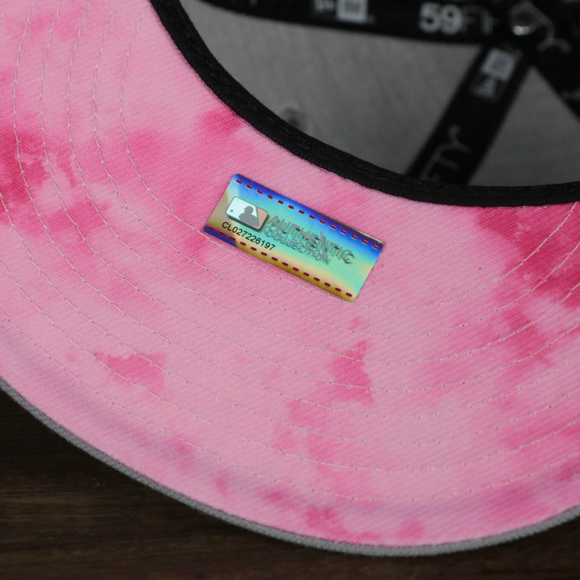 A close up of the authentic sticker on the Philadelphia Phillies 2022 Mother’s Day On-Field 59Fifty Fitted Cap