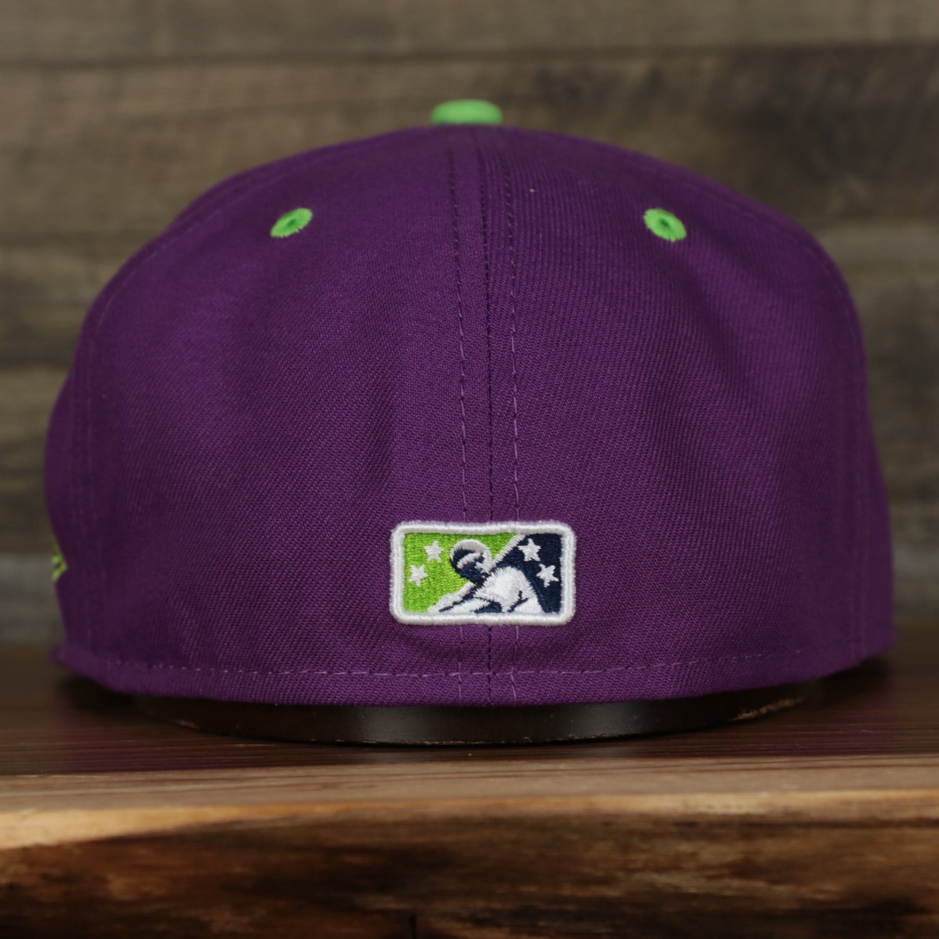 back of the Tri-City Dust Devils 2022 Vineros de Tri-City Copa de la Diversion On-Field Black Bottom 5950 Fitted Cap | Purple