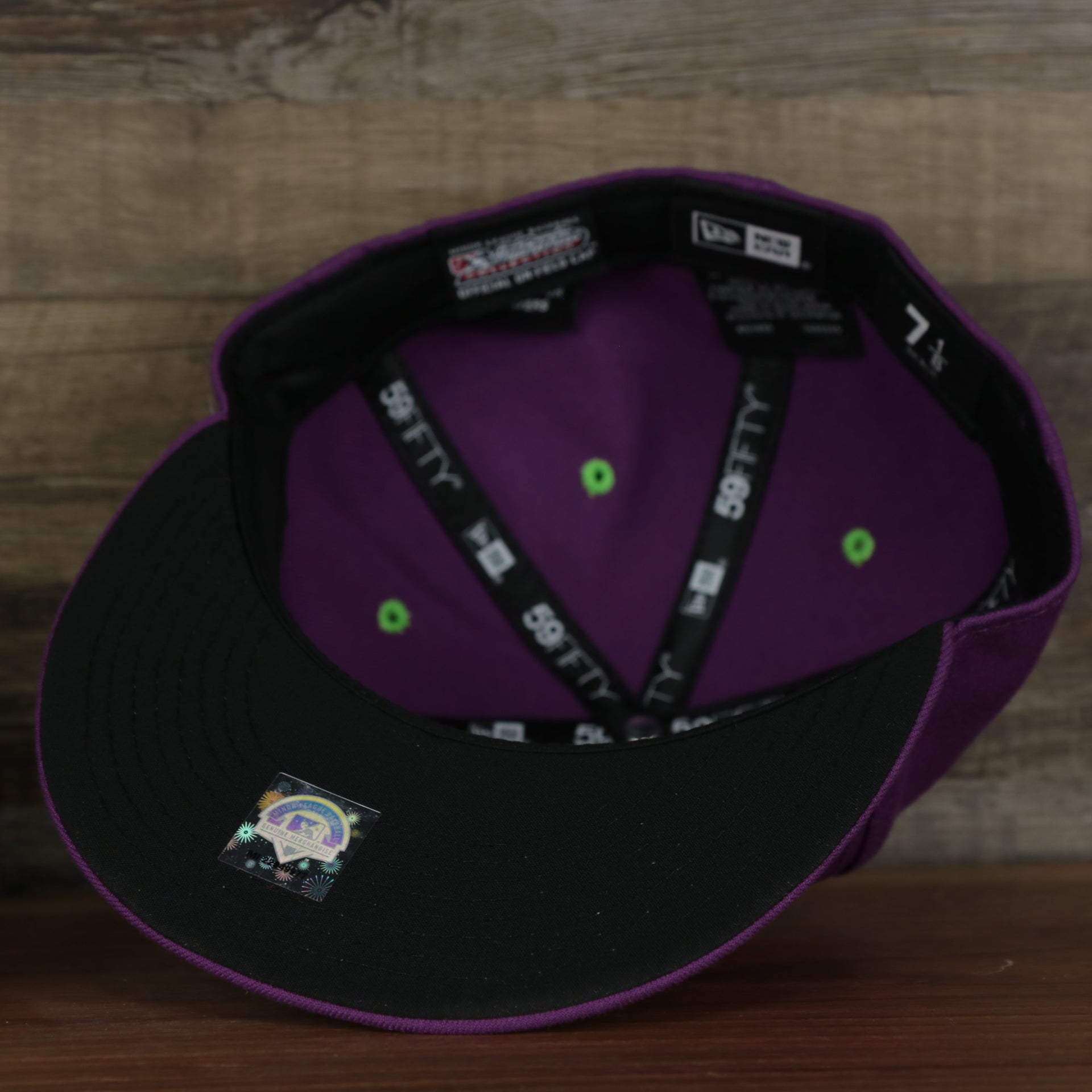 underside of the Tri-City Dust Devils 2022 Vineros de Tri-City Copa de la Diversion On-Field Black Bottom 5950 Fitted Cap | Purple