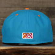 back of the Carolina Mudcats 2022 Pescados de Carolina Copa de la Diversion On-Field Black Bottom 5950 Fitted Cap | White/Blue