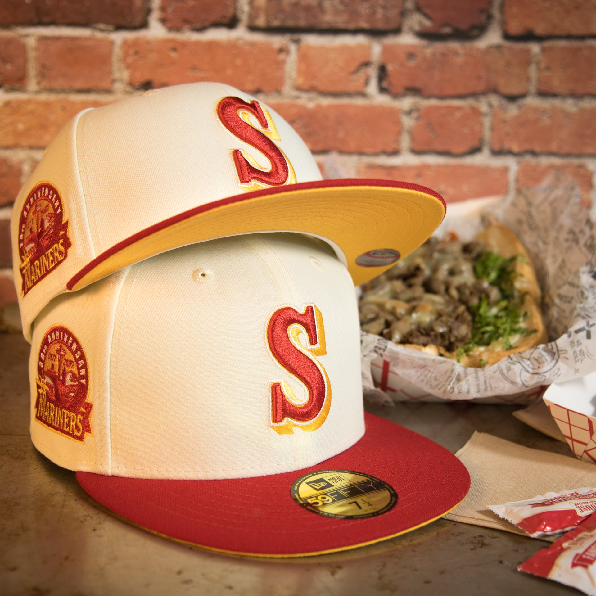 front of the Seattle Mariners Cooperstown 2007 30th Anniversary Side Patch Yellow UV 59Fifty Fitted Cap | Chrome/Red | CheeseSteak Pack Cap Swag Exclusive