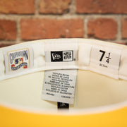 new era tag on the inside of the Seattle Mariners Cooperstown 2007 30th Anniversary Side Patch Yellow UV 59Fifty Fitted Cap | Chrome/Red | CheeseSteak Pack Cap Swag Exclusive