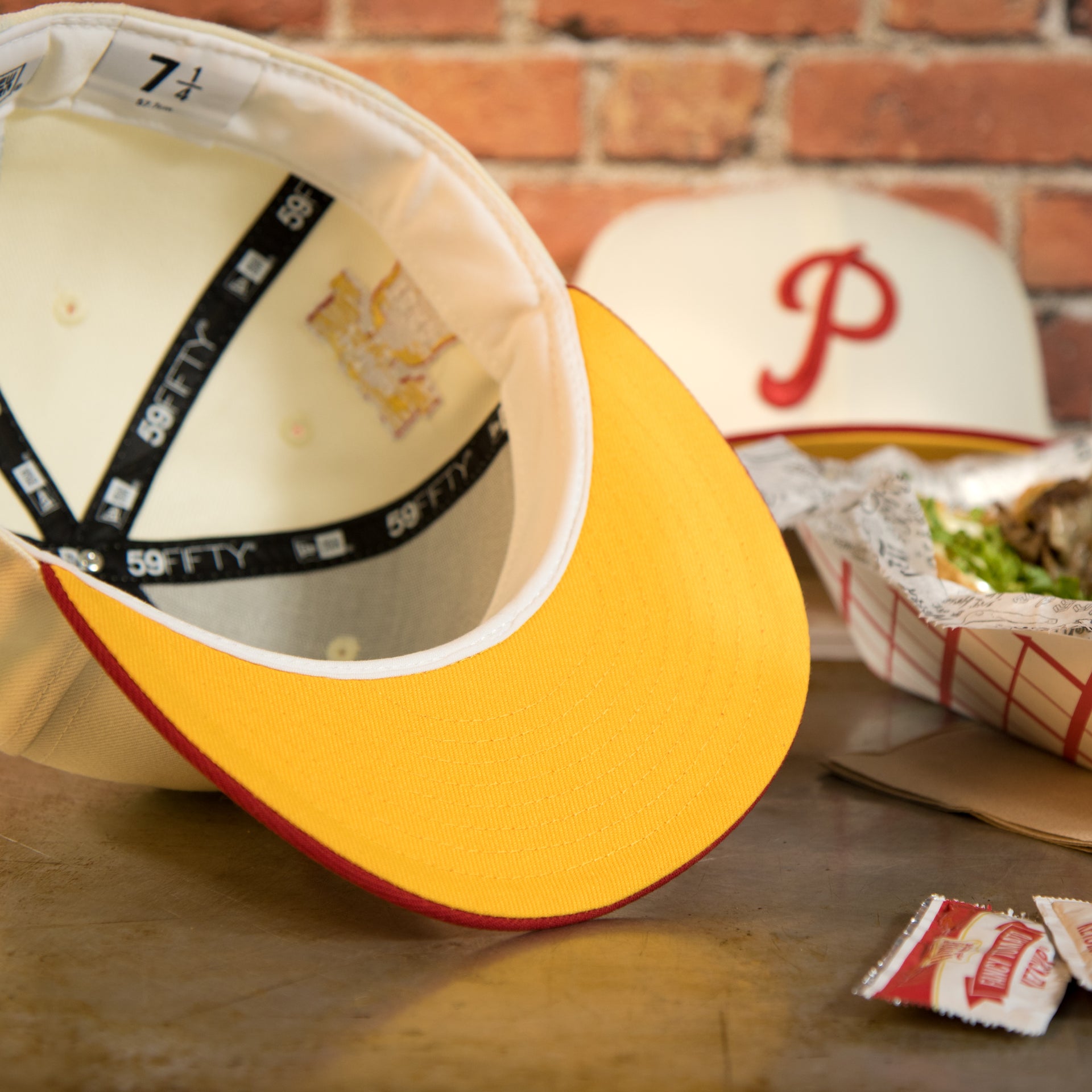 underside of the Philadelphia Phillies Cooperstown 1952 All Star Side Patch Yellow UV 59Fifty Fitted Cap | Chrome/Red | CheeseSteak Pack Cap Swag Exclusive