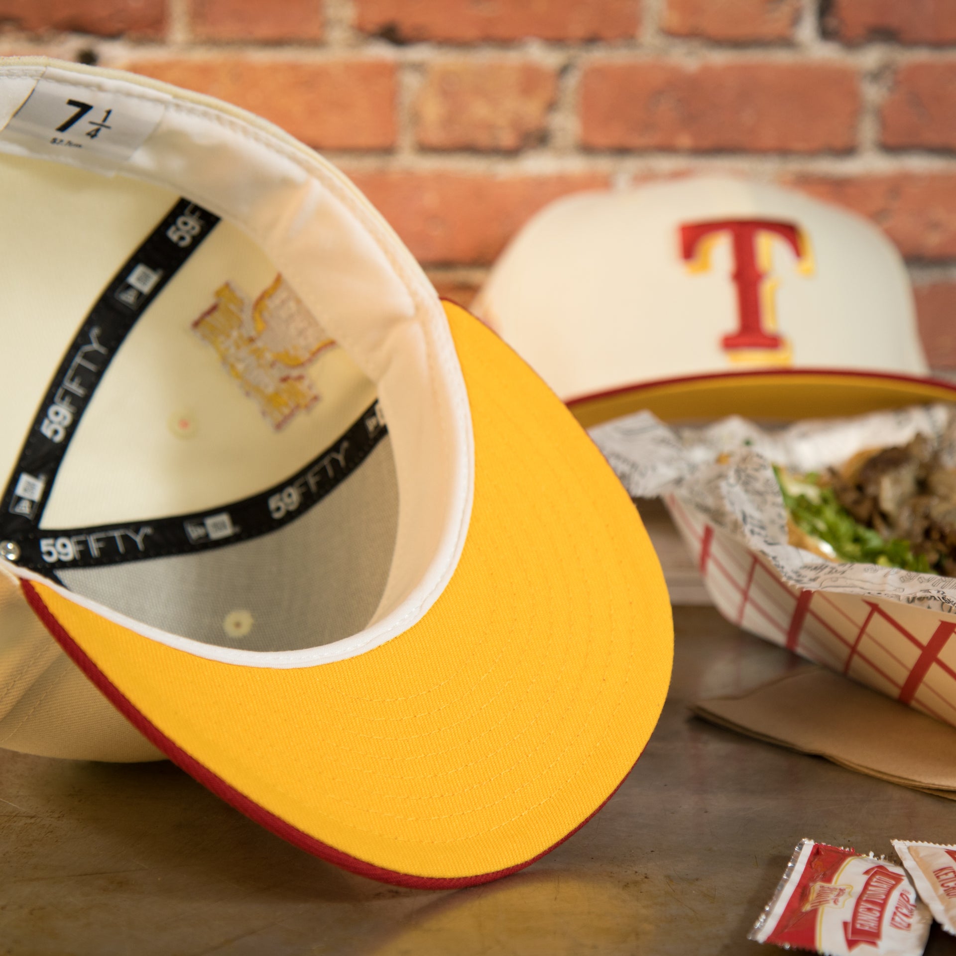 under side of the Texas Rangers Cooperstown 1995 All Star Side Patch Yellow UV 59Fifty Fitted Cap | Chrome/Red | CheeseSteak Pack Cap Swag Exclusive