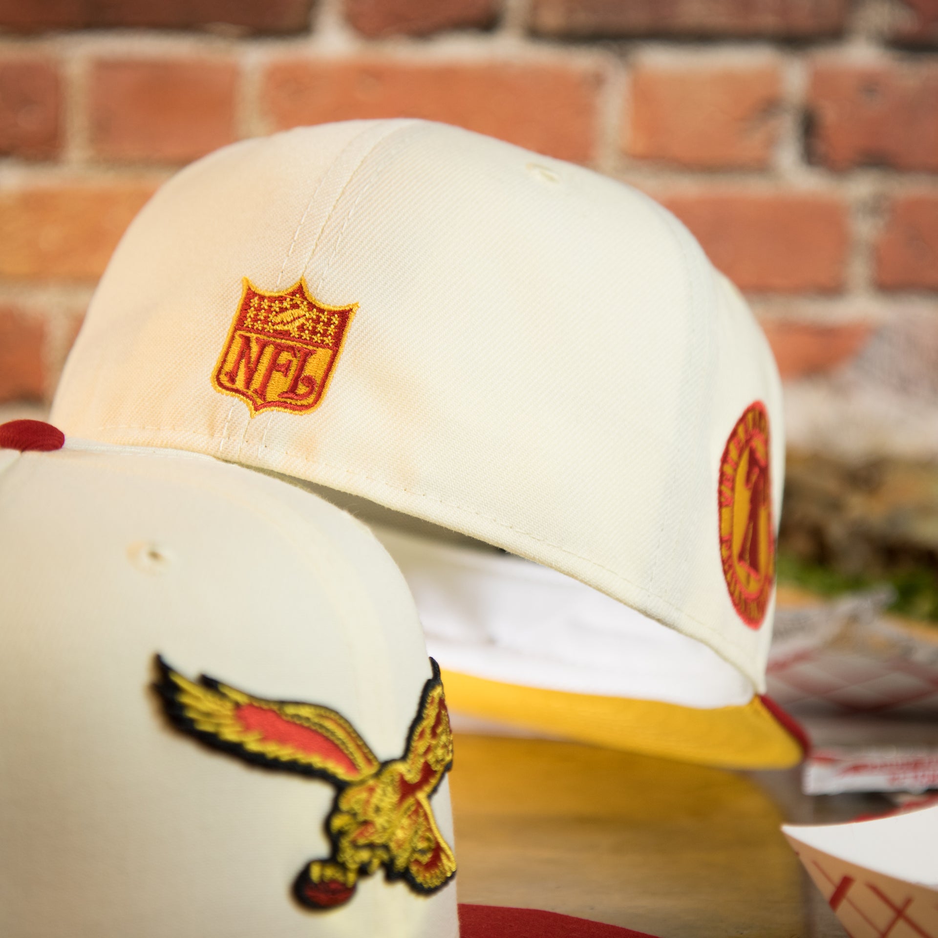 nfl shield on the back of the Philadelphia Eagles Throwback Veterans Stadium Side Patch Yellow UV 59Fifty Fitted Cap | Chrome/Red | CheeseSteak Pack Cap Swag Exclusive