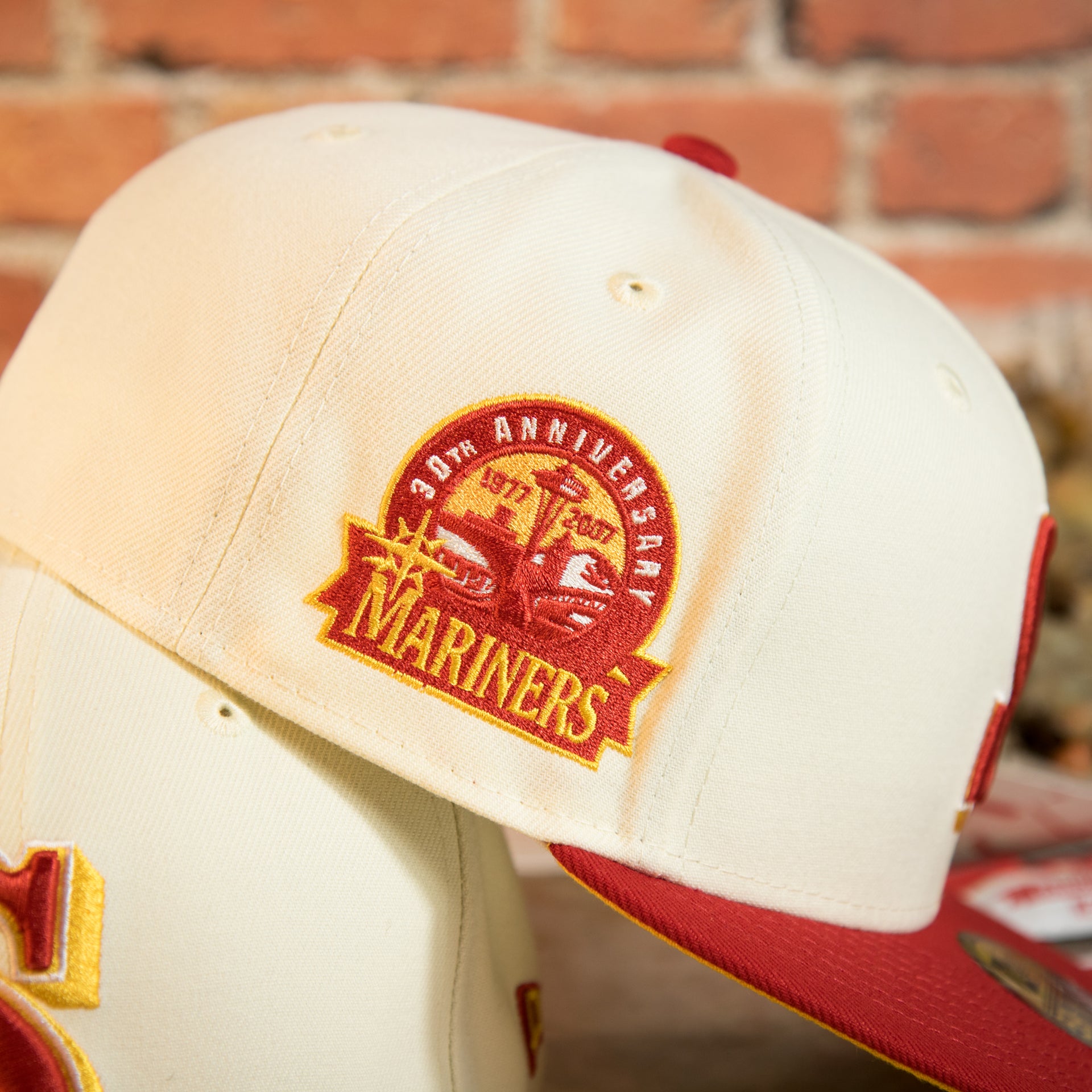 wearers right side of the Seattle Mariners Cooperstown 2007 30th Anniversary Side Patch Yellow UV 59Fifty Fitted Cap | Chrome/Red | CheeseSteak Pack Cap Swag Exclusive