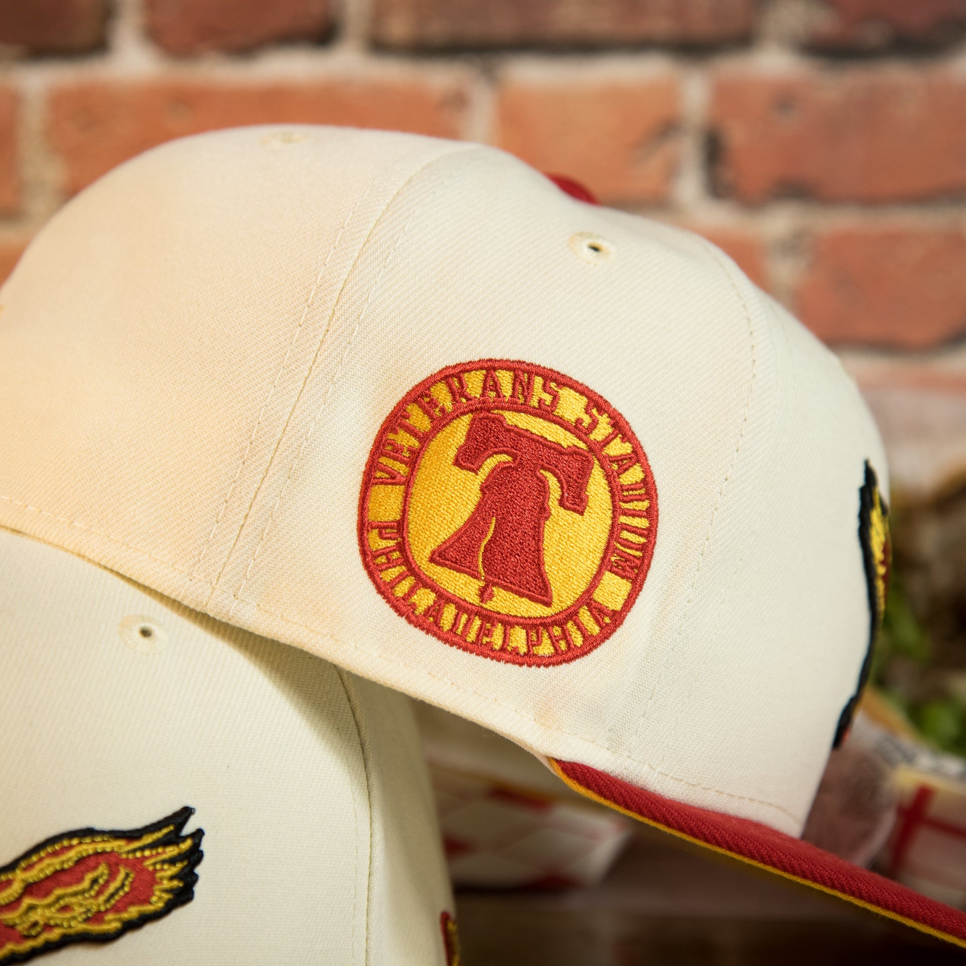 veterans stadium side patch on the Philadelphia Eagles Throwback Veterans Stadium Side Patch Yellow UV 59Fifty Fitted Cap | Chrome/Red | CheeseSteak Pack Cap Swag Exclusive