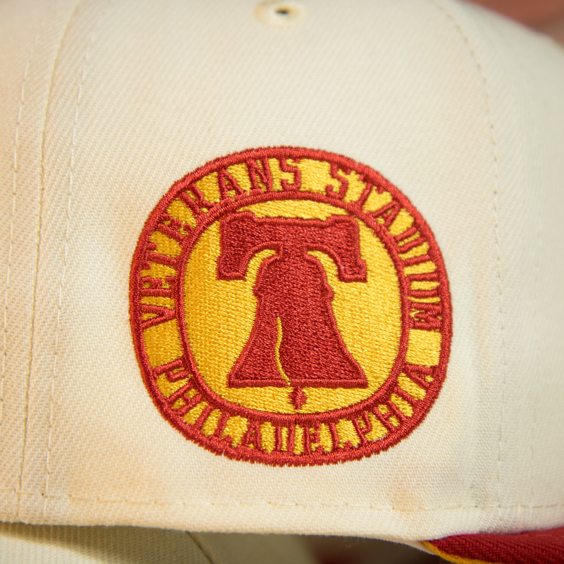 side patch on the Philadelphia Eagles Throwback Veterans Stadium Side Patch Yellow UV 59Fifty Fitted Cap | Chrome/Red | CheeseSteak Pack Cap Swag Exclusive