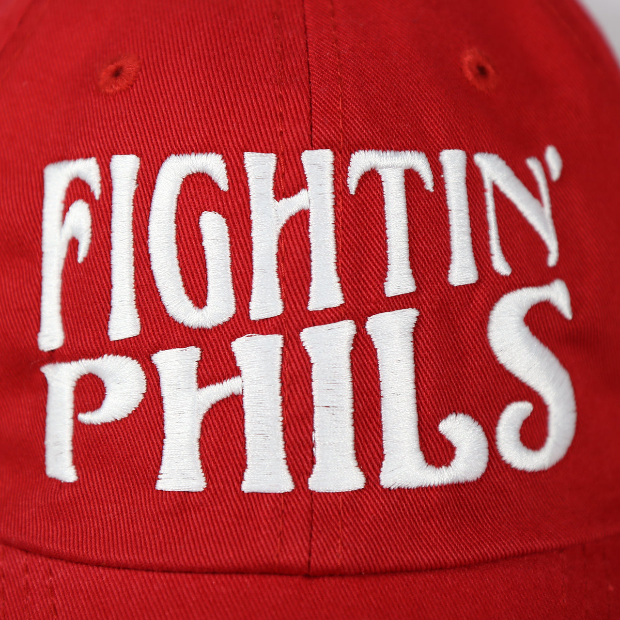 fightin' phils slogan on the Philadelphia Phillies 2022 World Series Fightin' Phils Phillies Logo Side Patch Red Adjustable Dad Hat