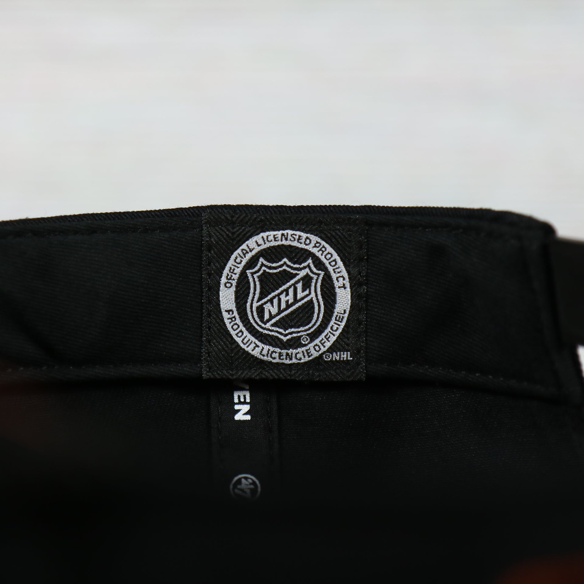 nhl logo on the inside of the Philadelphia Flyers Black Snapback Dad Hat | Black Adjustable Baseball Cap\