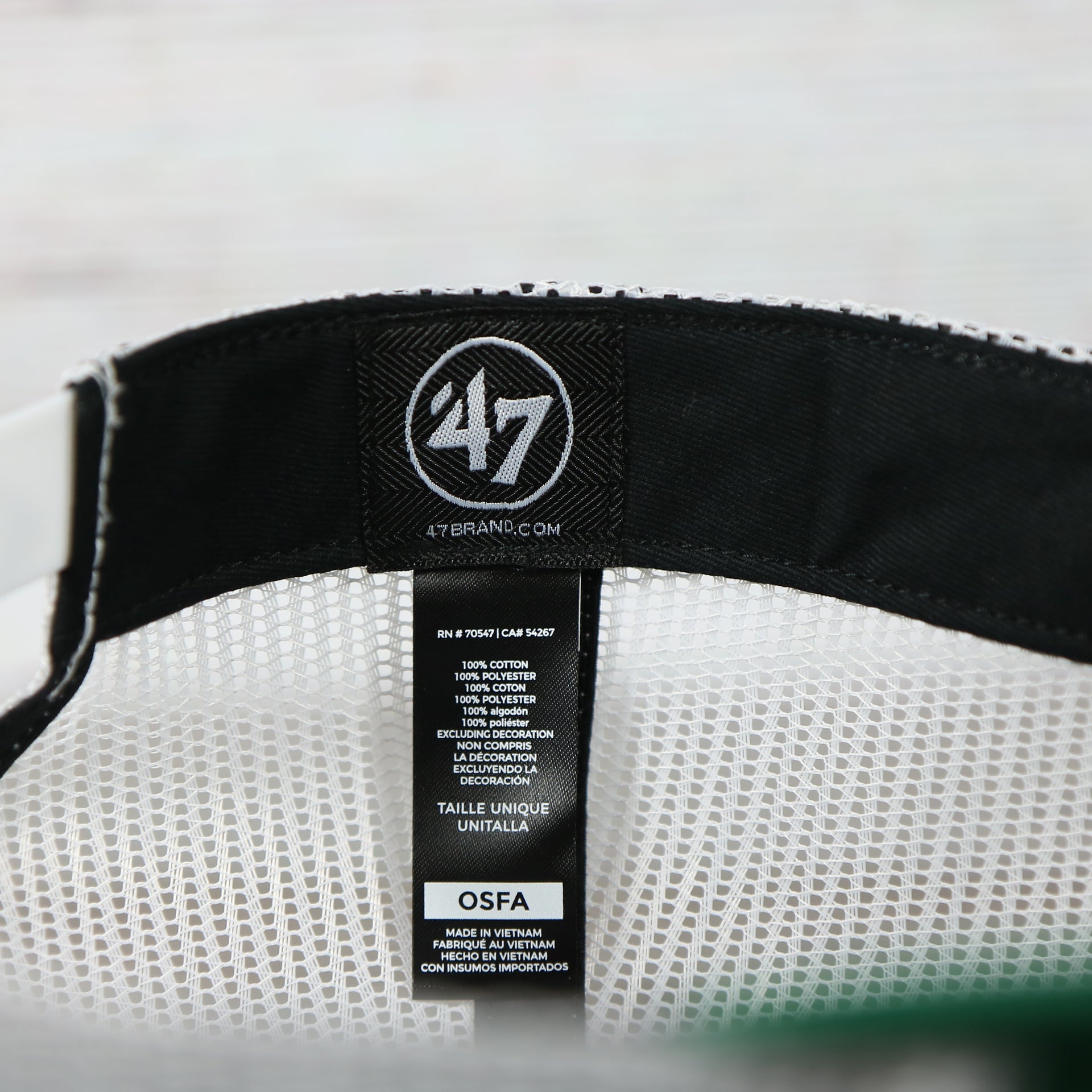 47 brand tag on the Philadelphia Eagles Throwback Mesh Back Trucker Hat | Kelly Green Trucker Hat