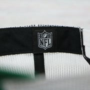 nfl logo tag on the Philadelphia Eagles Throwback Mesh Back Trucker Hat | Kelly Green Trucker Hat