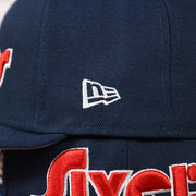 New Era logo on the wearer's left of the Philadelphia 76ers 2022 City Edition Sixers Script Spectrum Side Patch 9Fifty Snapback Hat