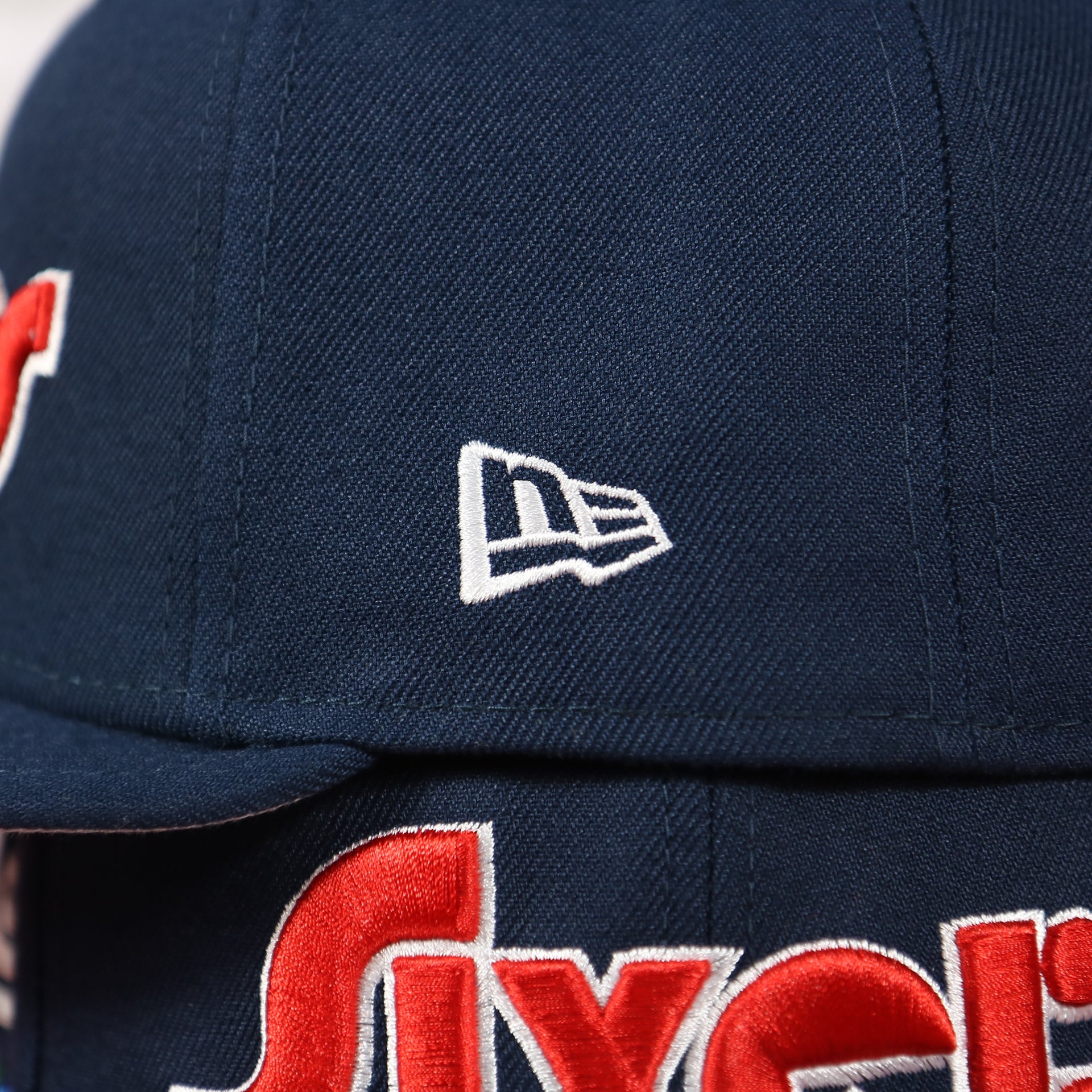 New Era logo on the wearer's left of the Philadelphia 76ers 2022 City Edition Sixers Script Spectrum Side Patch 9Fifty Snapback Hat