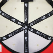 Taping on the interior of the Philadelphia 76ers 2022 City Edition Sixers Script Spectrum Side Patch Chrome/Navy 59Fifty Fitted Cap