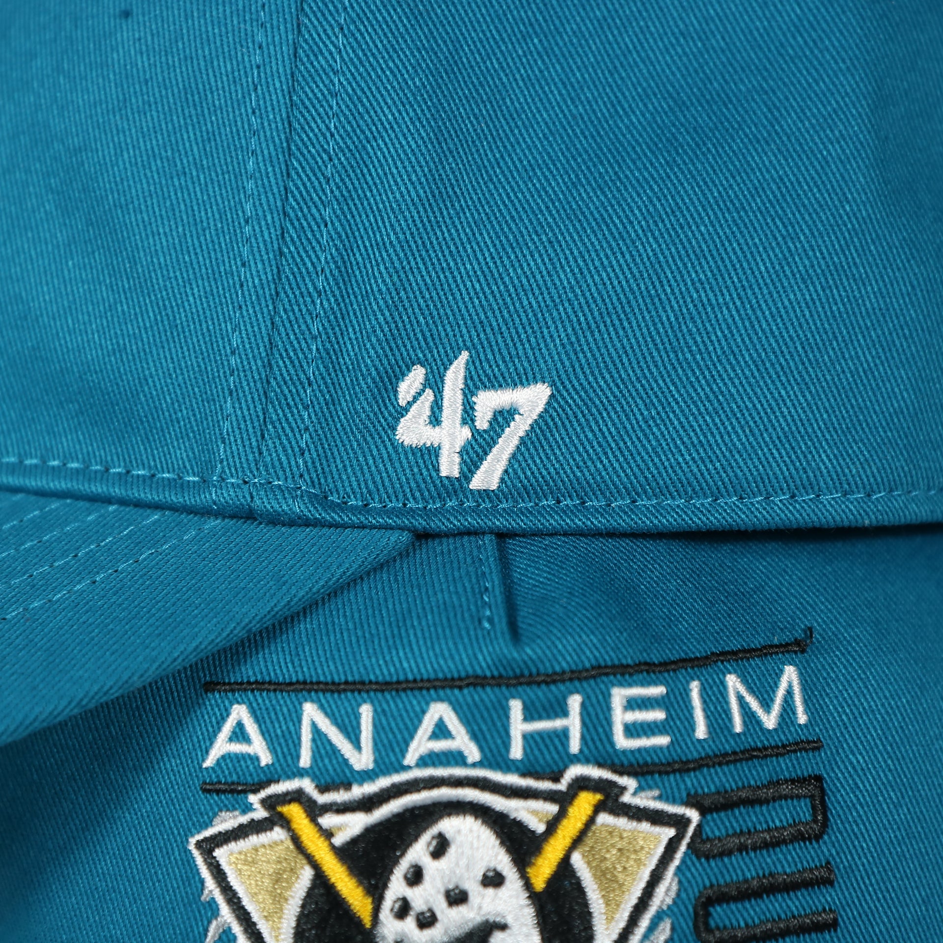 47 brand logo on the front of the Anaheim Ducks Throwback Blue Snapback Dad Hat | Blue Adjustable Baseball Cap