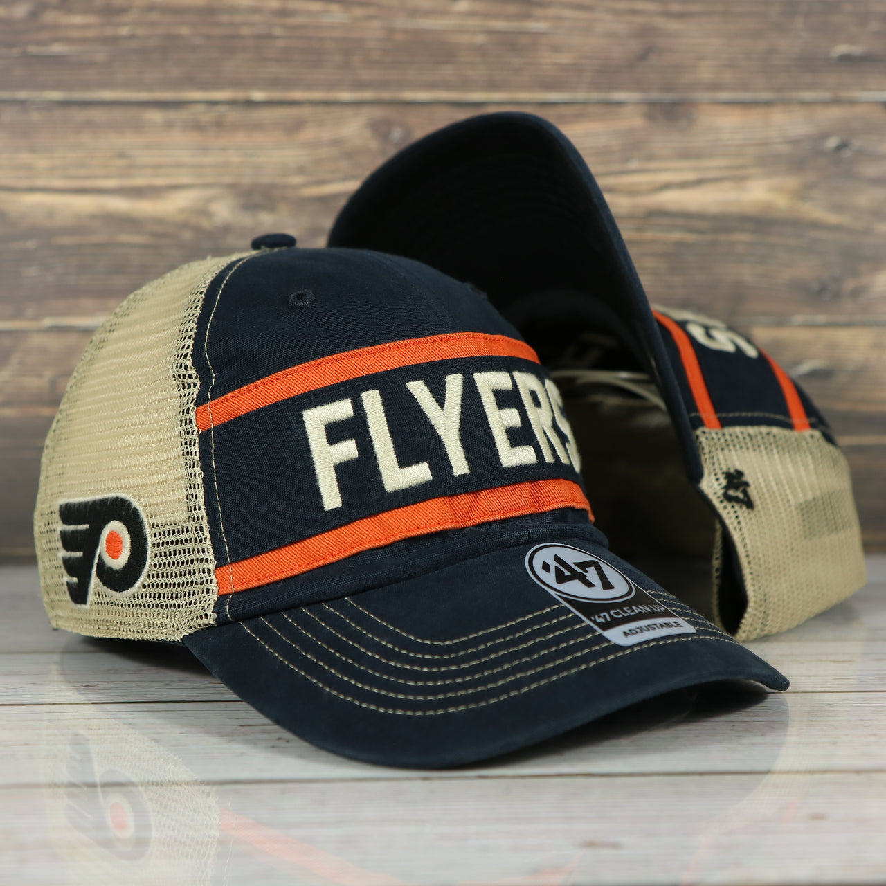 front and bottom of the Philadelphia Flyers Vintage Meshback Orange/Black Trucker Snapback Hat