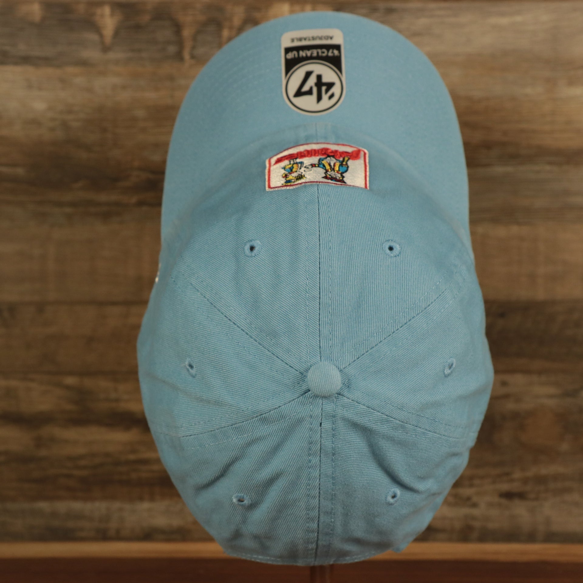 top view of the Philadelphia Phillies 1970 Quaker Logo Powder Blue Adjustable Dad Hat