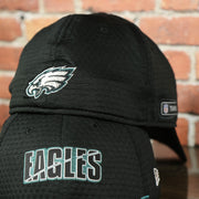 back side of the Eagles 2020 Training Camp Flexfit | Philadelphia Eagles 2020 On-Field Black Training Camp Stretch Fit