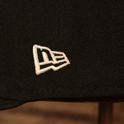 Close up of the New Era logo on the New York Mets 1986 World Series Script Patch Gray Bottom 59Fifty Fitted Cap