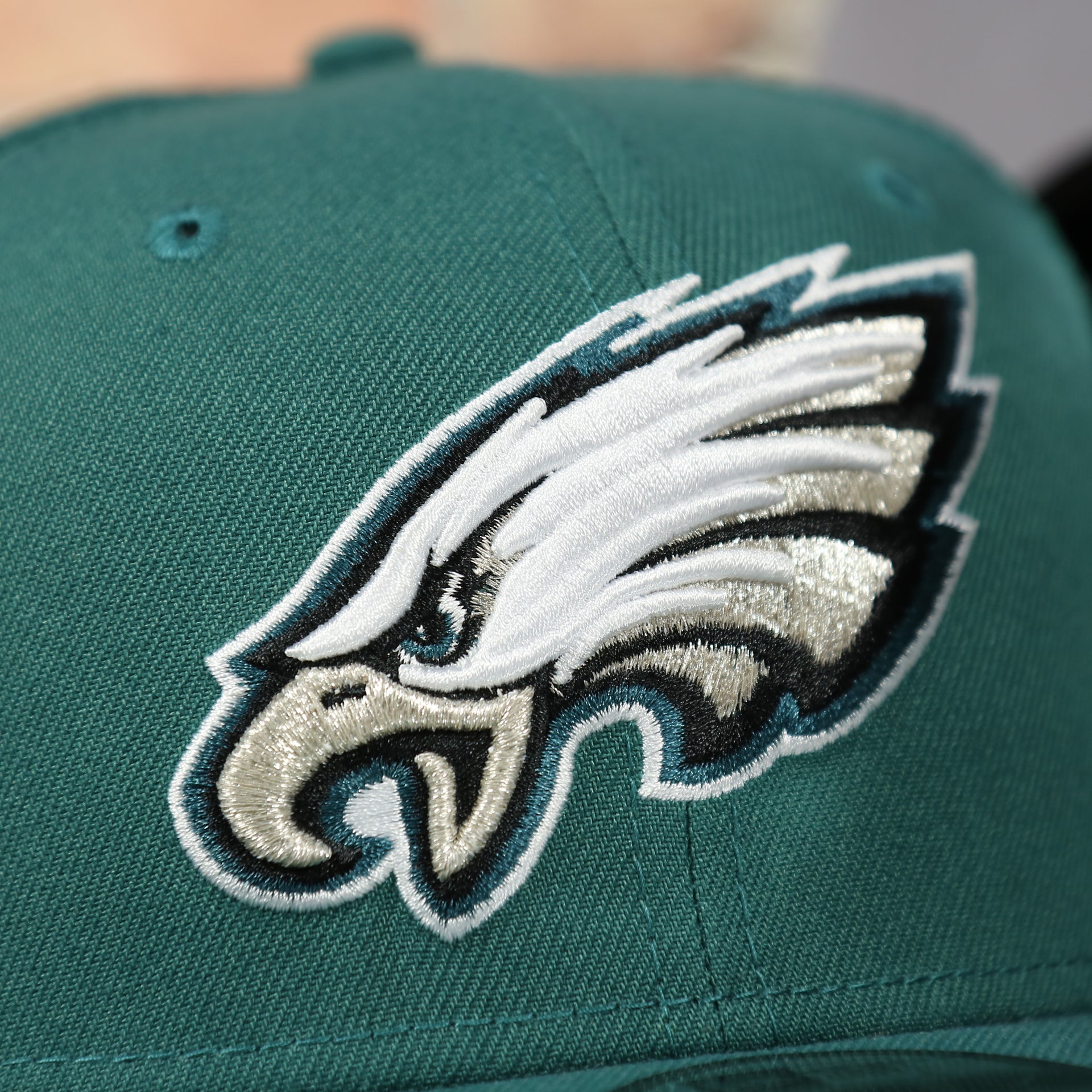 eagles logo on the front of the Philadelphia Eagles Trucker Meshback Gray Bottom 9Fifty Snapback | Green | OSFM