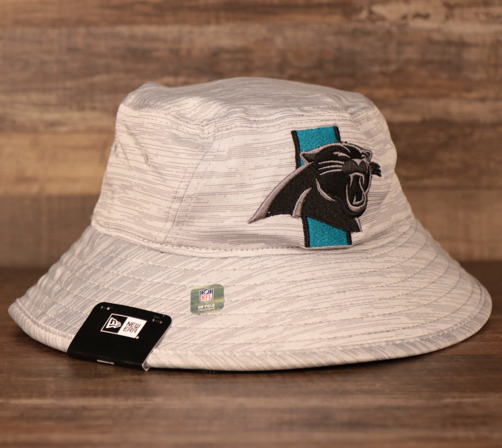 The gray Carolina Panthers New Era 2021 Training bucket hat by New Era.