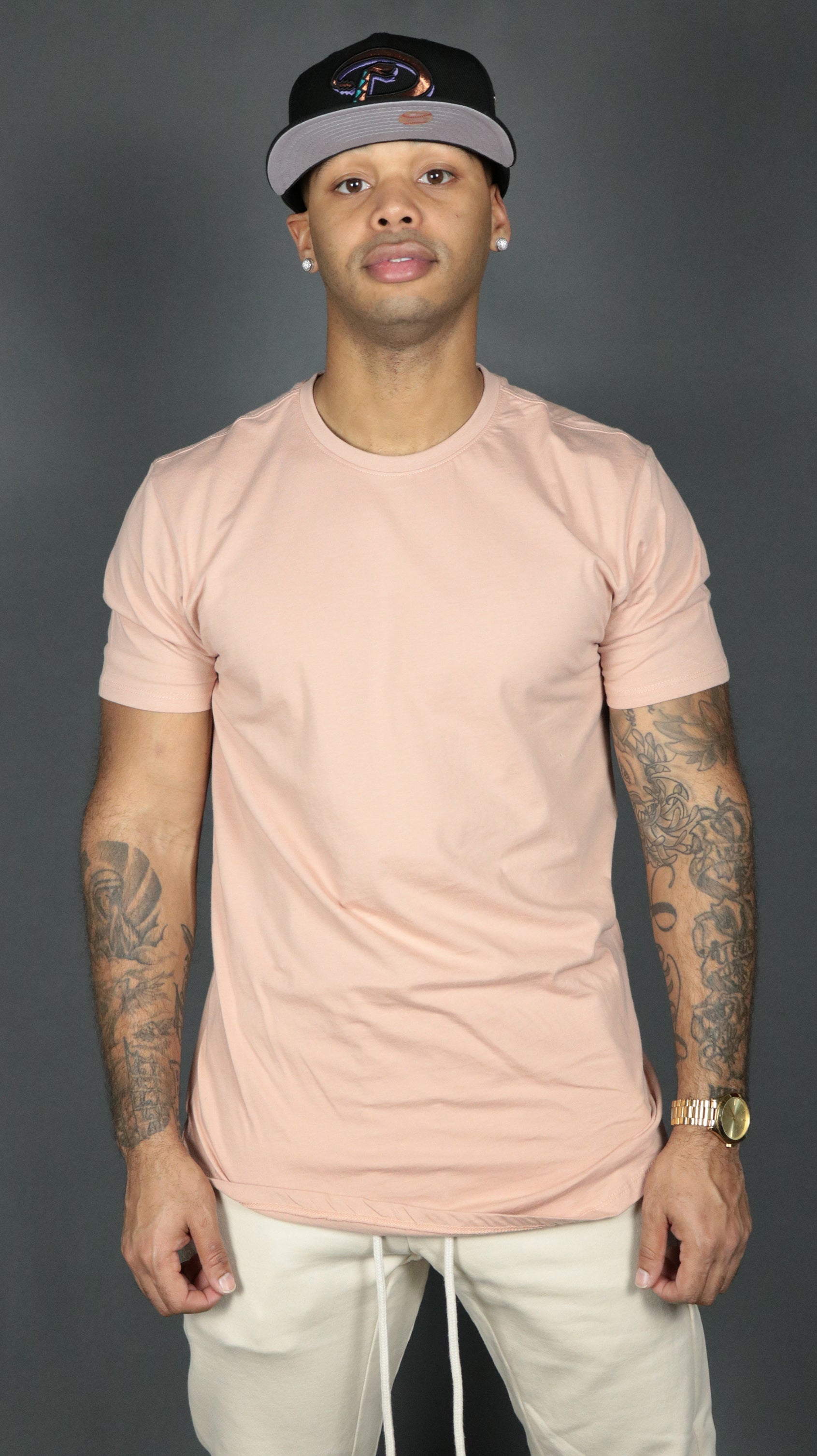 The Jordan Craig pink men scoop bottom longline tshirt.