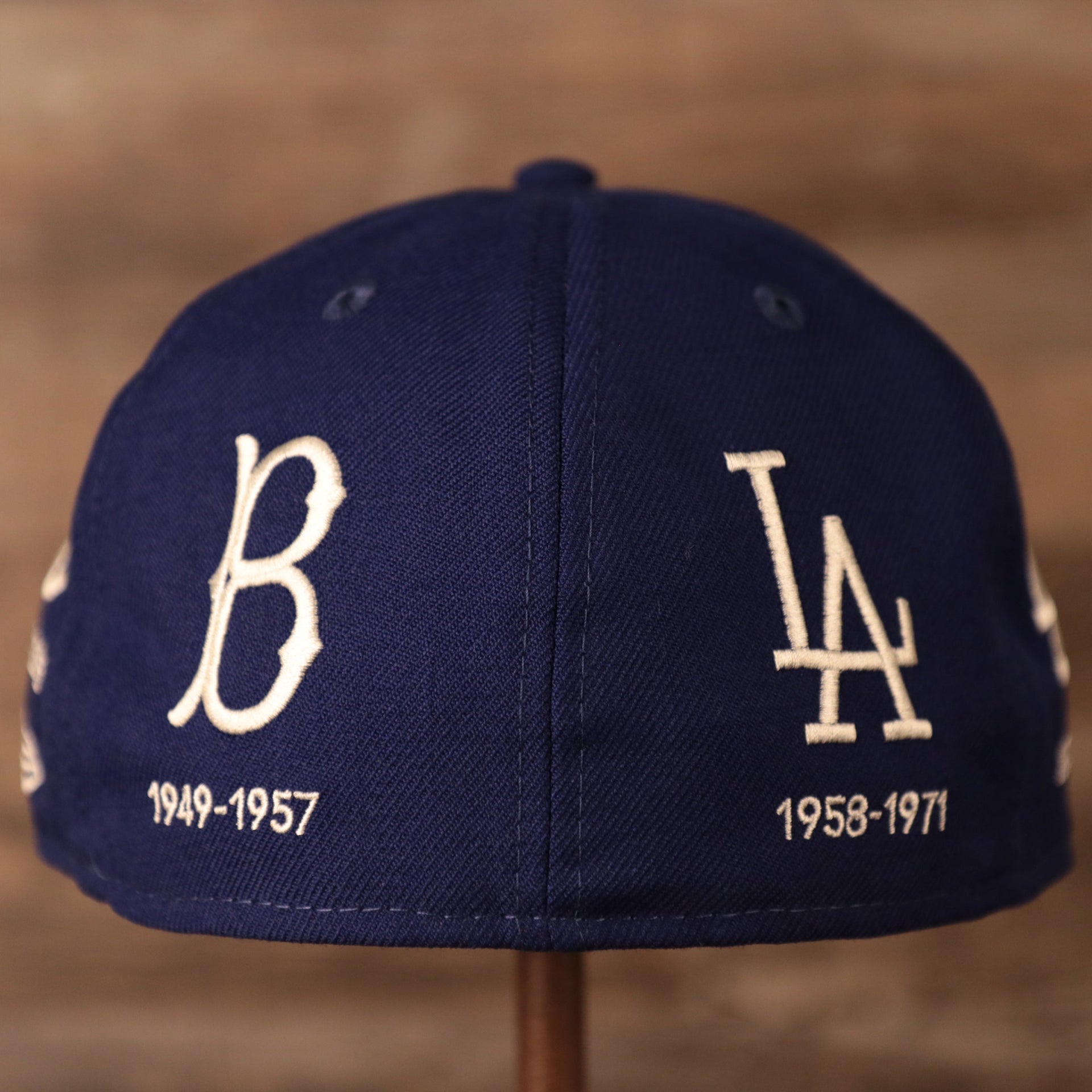 The vintage logos of the Los Angeles Dodgers on the back of the navy New Era 59fifty.