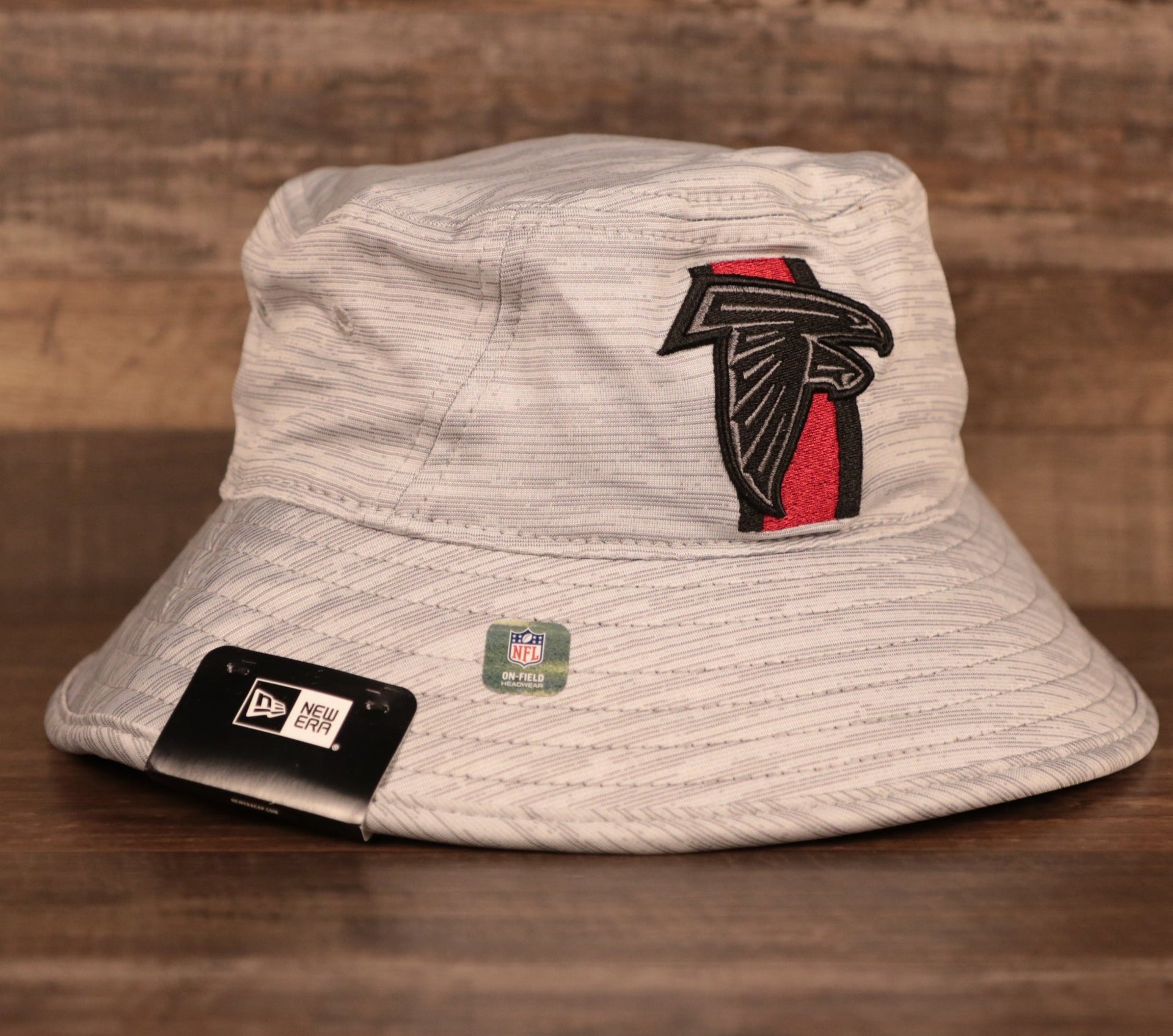 The gray Atlanta Falcons training hat 2021 bucket hat by New Era.