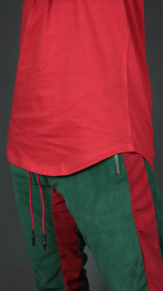 The scoop bottom of the red men's longline t-shirt by Jordan Craig.