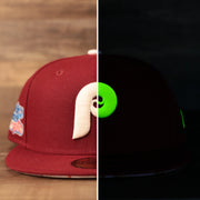The glow in the dark Philadelphia Phillies flower under brim fitted cap by New Era.