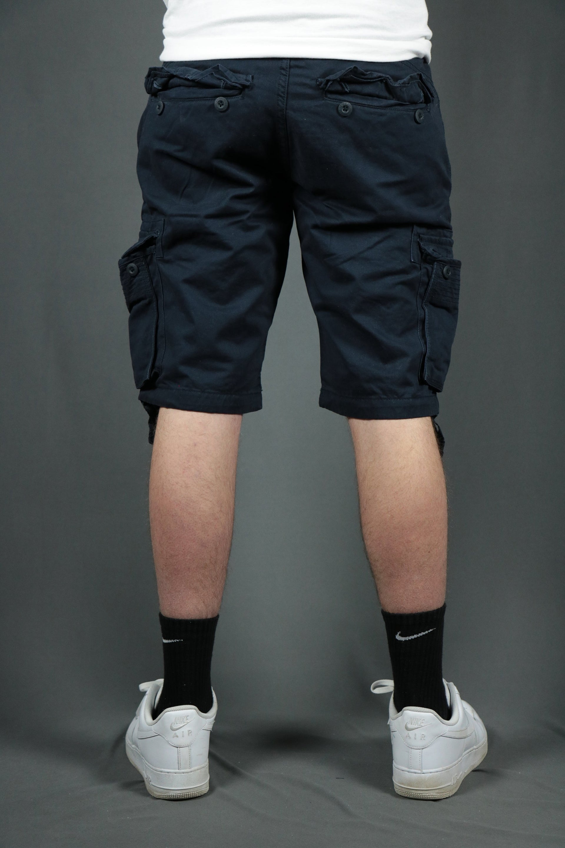 back side of the Jordan Craig Bedrock Cargo Shorts Navy