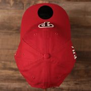 A top side view of the crown of the Philadelphia Phillies red MLB on field fourth of July 9twenty dad by New Era.