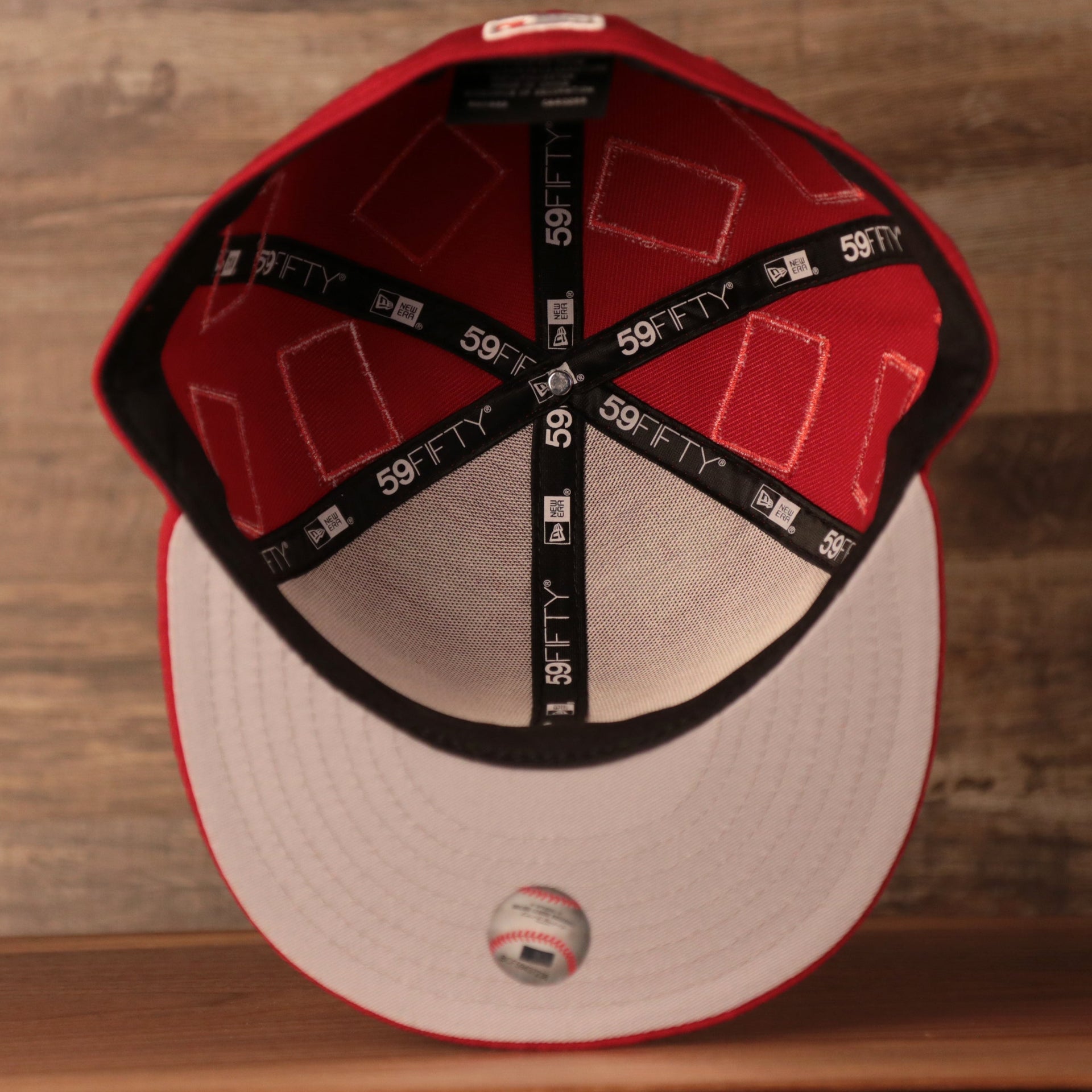 Phillies World Flags Gray Bottom Fitted Cap | Philadelphia Phillies International Flags Red Grey Under Brim Fitted Cap the bottom of the brim on this phillies flag cap is grey