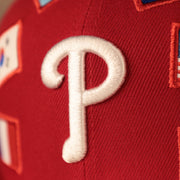 Phillies World Flags Gray Bottom Fitted Cap | Philadelphia Phillies International Flags Red Grey Under Brim Fitted Cap the Phillies logo on the front of this cap is white