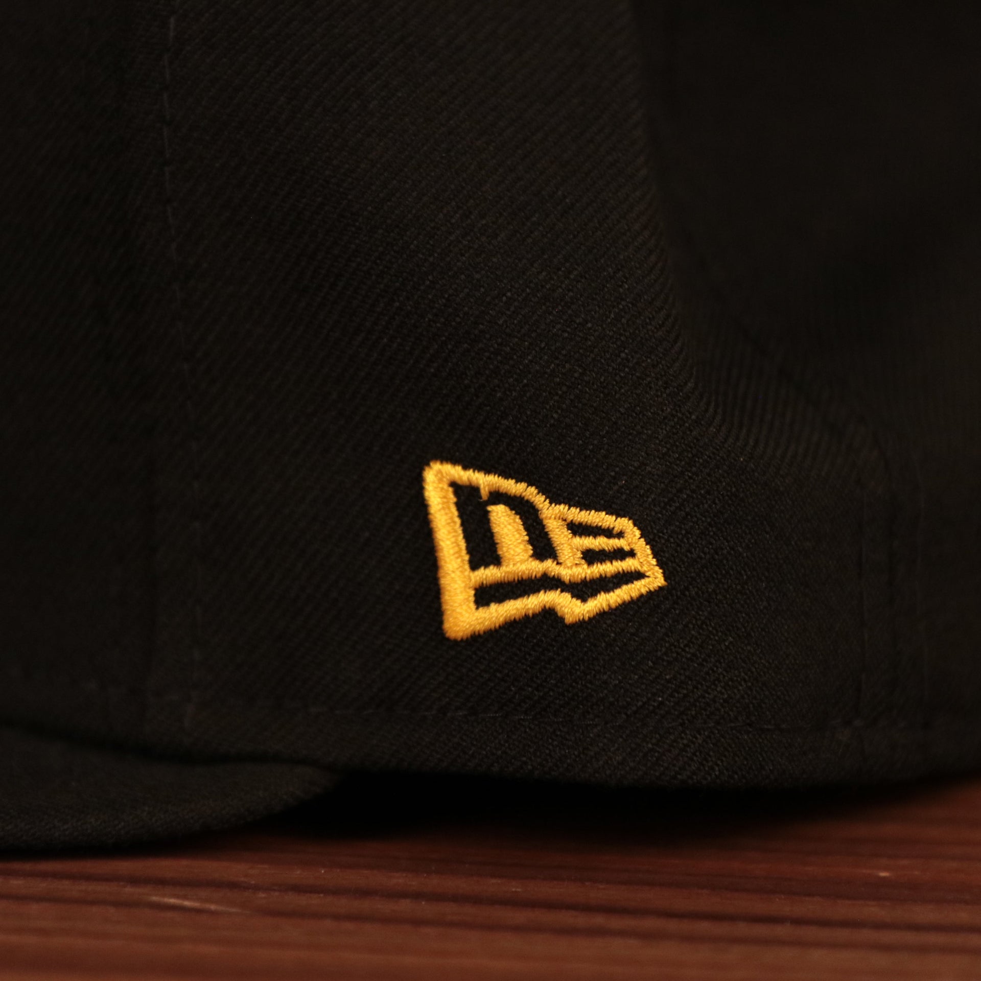 The yellow New Era flag on the left side of the Philly's cheesesteak without onions fitted cap.