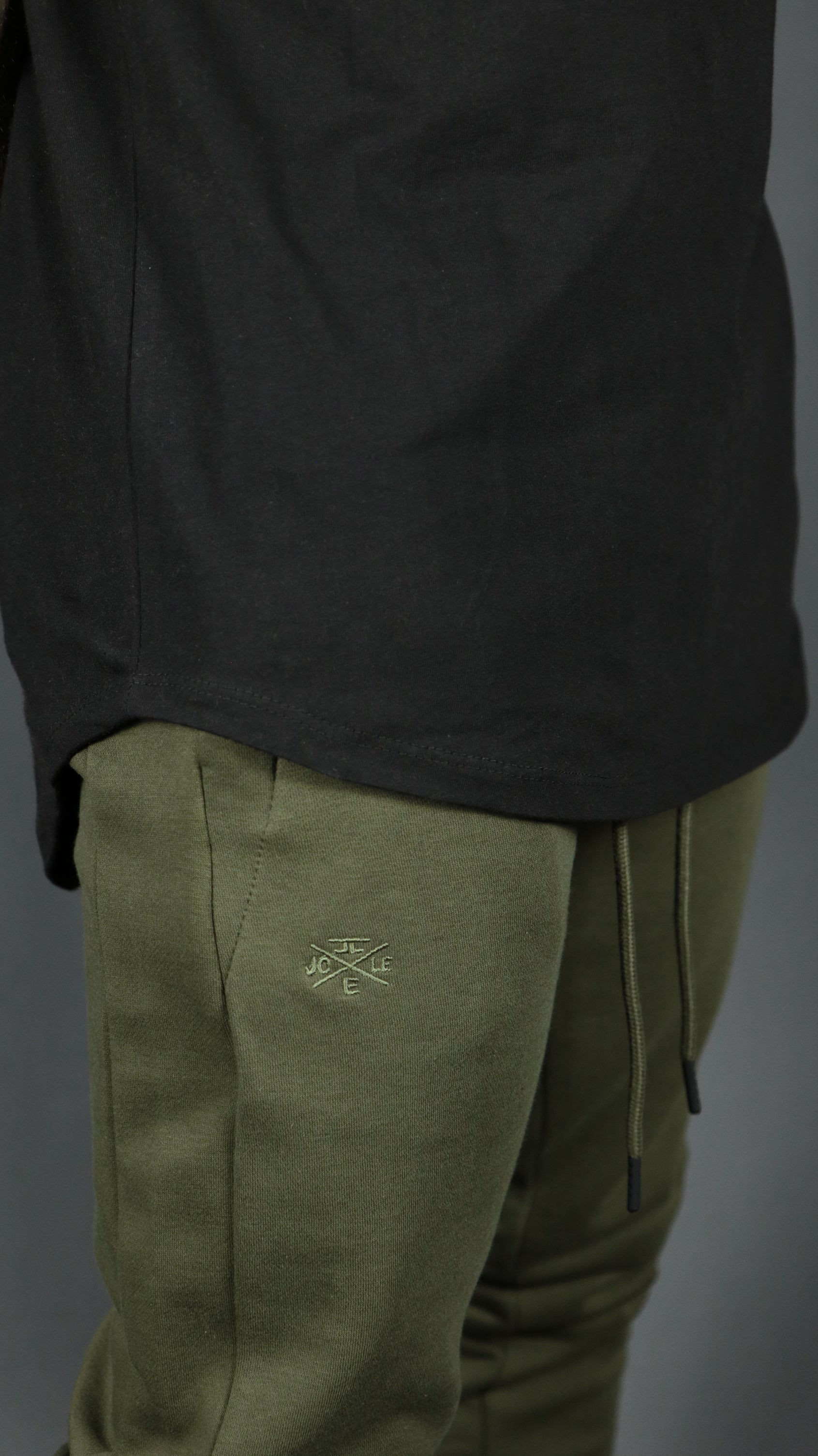 The black longline curved hem tshirt for men by Jordan Craig.