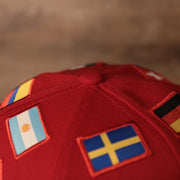 Phillies World Flags Gray Bottom Fitted Cap | Philadelphia Phillies International Flags Red Grey Under Brim Fitted Cap the button on the top of this phillies international cap is red