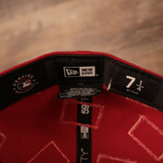 the new era tag on the inside is black Phillies World Flags Gray Bottom Fitted Cap | Philadelphia Phillies International Flags Red Grey Under Brim Fitted Cap