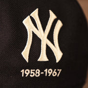 Bronx Bombers vintage logo on the navy New Era 59fifty with an all-over logo history design.