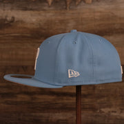The left side of the Phillies 1996 All Star Game pink under brim fitted 59fifty cap by New Era.