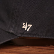 The wearer's left side of the dodgers pink bottom dad hat has the logo of 47 Brand.